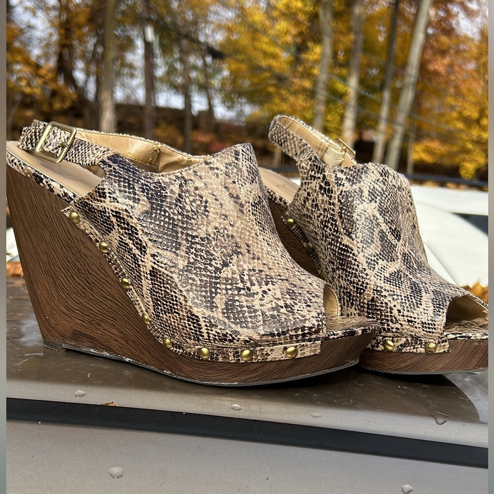 Snake skins print wedge heel can dress up or casual colors nudes comfy wear.